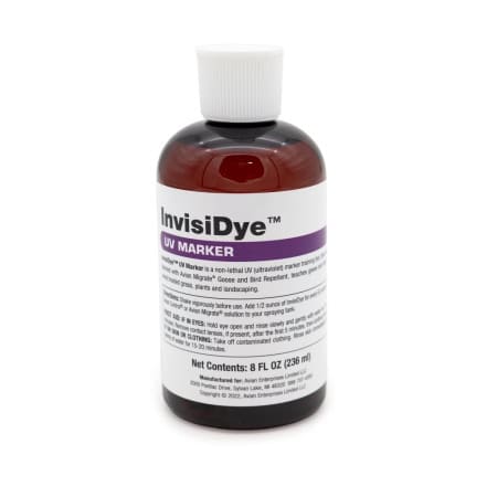 brown glass bottle of invisidye liquid