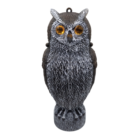 A realistic owl decoy with detailed black and white feathering, designed for pest control. The decorative sculpture features amber-colored reflective gemstone eyes, a textured body, and an eyelet at the top for hanging. This predator replica stands upright in a natural perched position and is crafted to deter birds, rodents, and other garden pests.